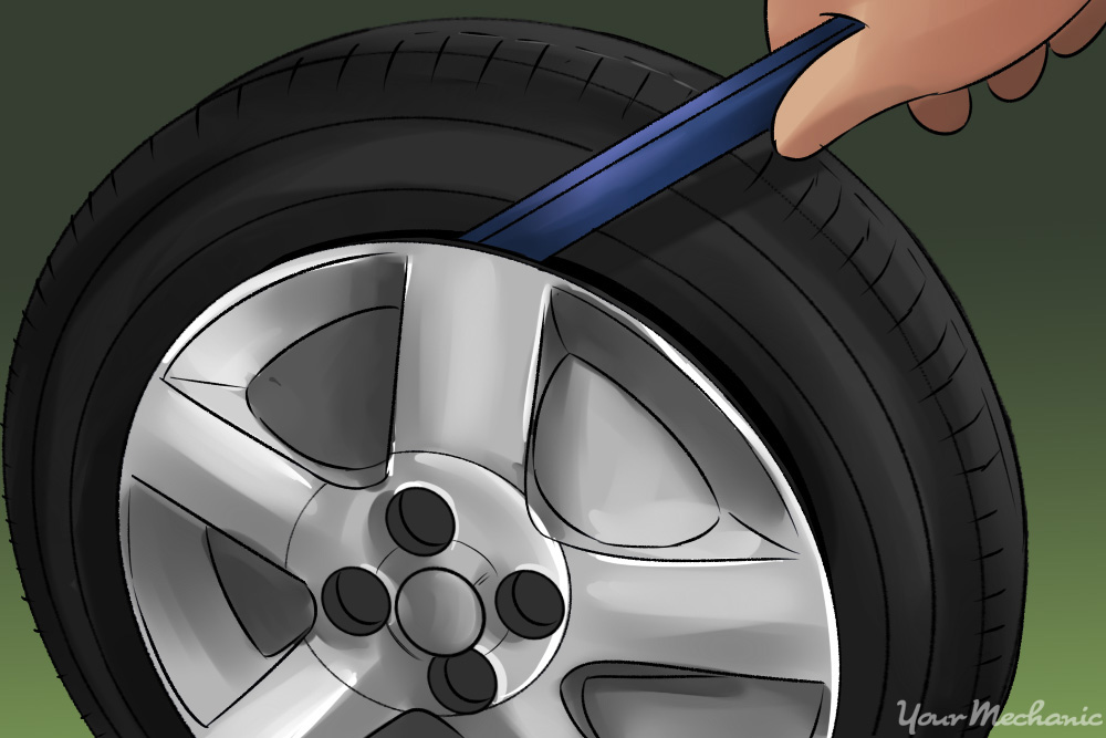 How to Change a Tire YourMechanic Advice